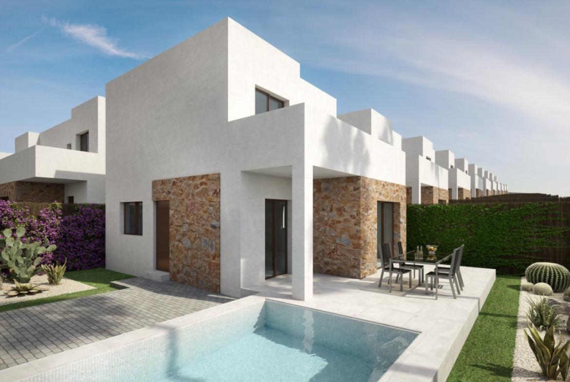 Semi-detached villas in Villamartin with views of the golf course and Mediterranean landscape.