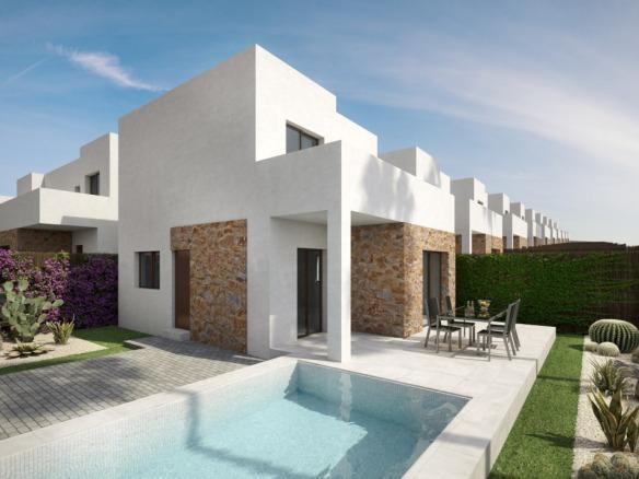 Semi-detached villas in Villamartin with views of the golf course and Mediterranean landscape.