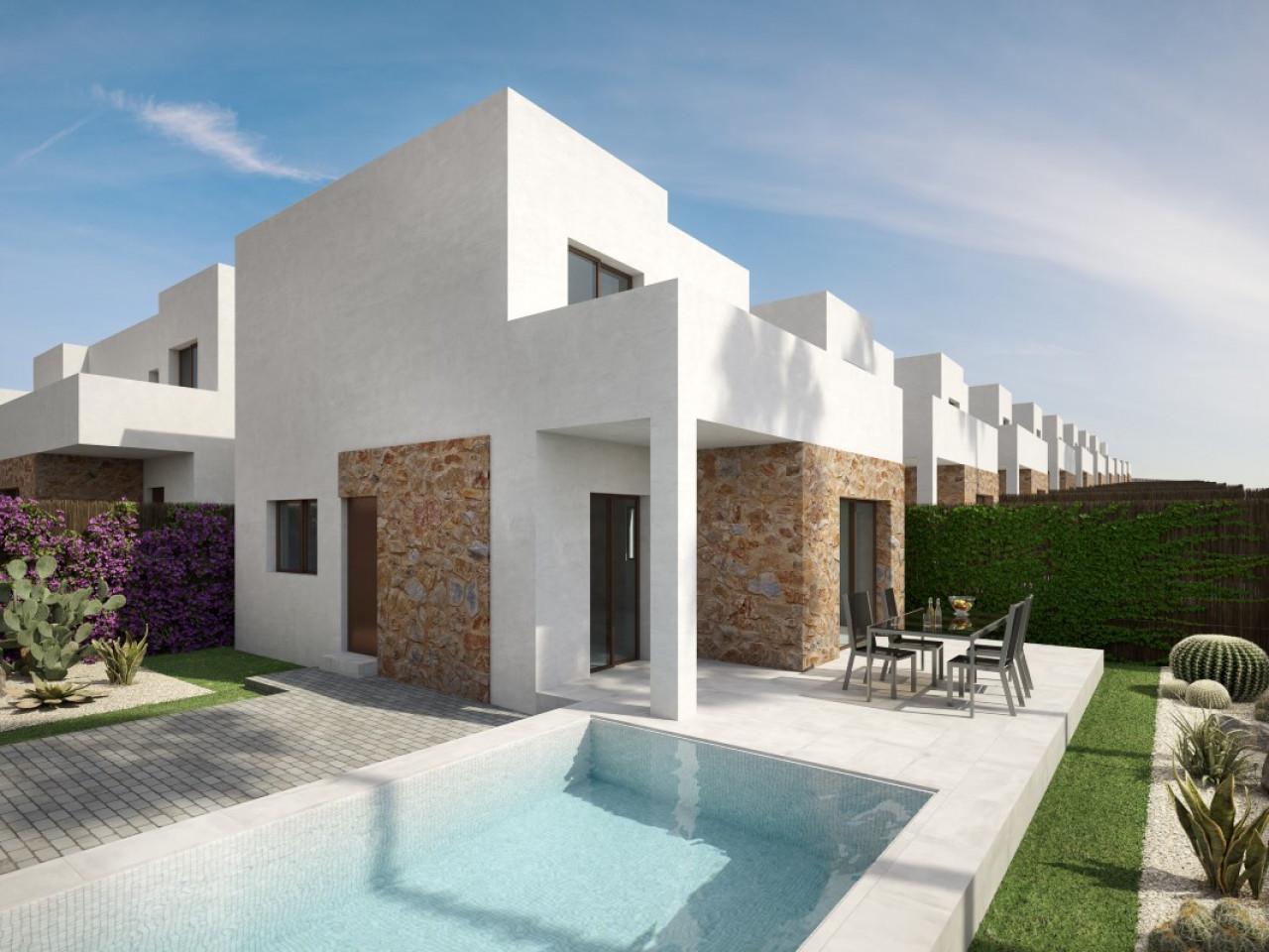 Semi-detached villas in Villamartin with views of the golf course and Mediterranean landscape.
