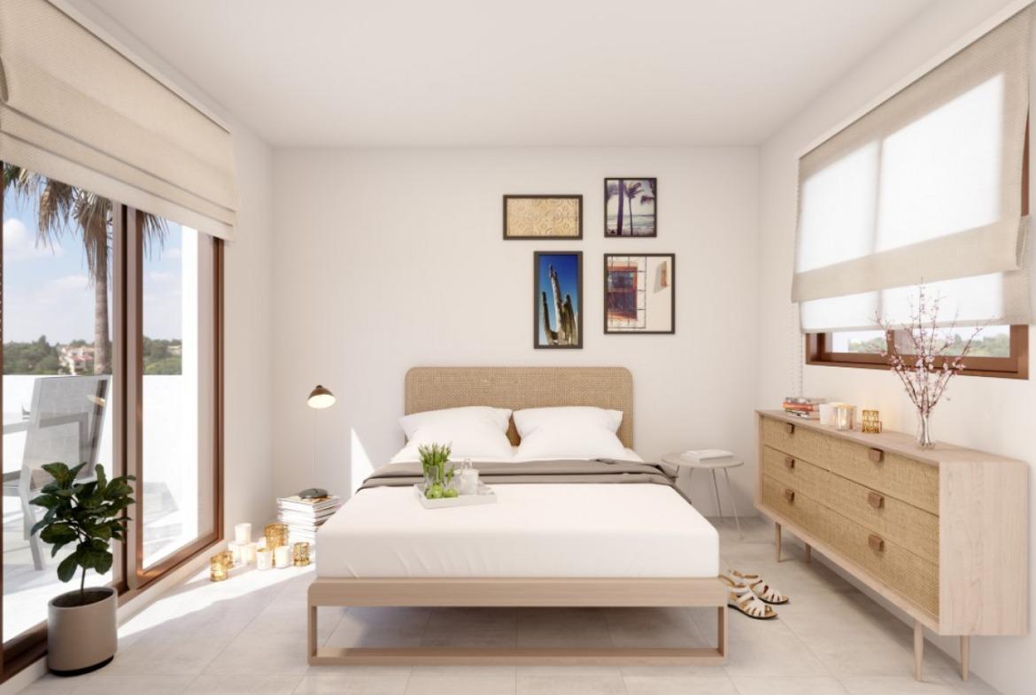 Semi-detached villas in Villamartin with views of the golf course and Mediterranean landscape.