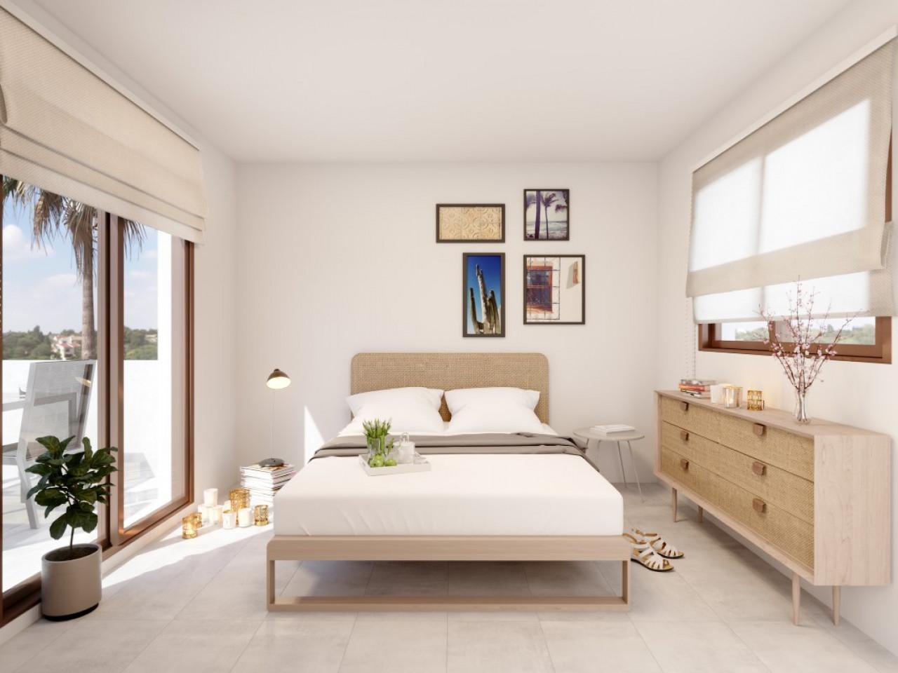 Semi-detached villas in Villamartin with views of the golf course and Mediterranean landscape.