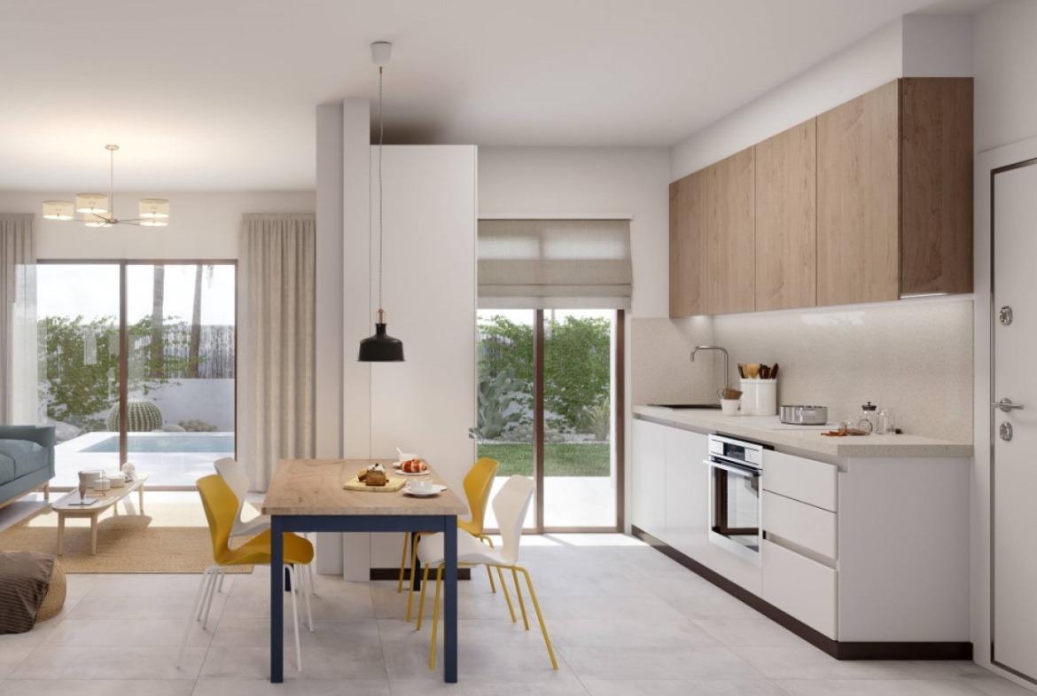 Semi-detached villas in Villamartin with views of the golf course and Mediterranean landscape.