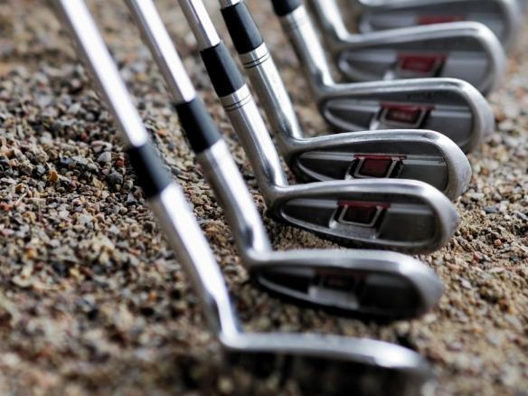 Golf clubs laid out o with realistic average distances