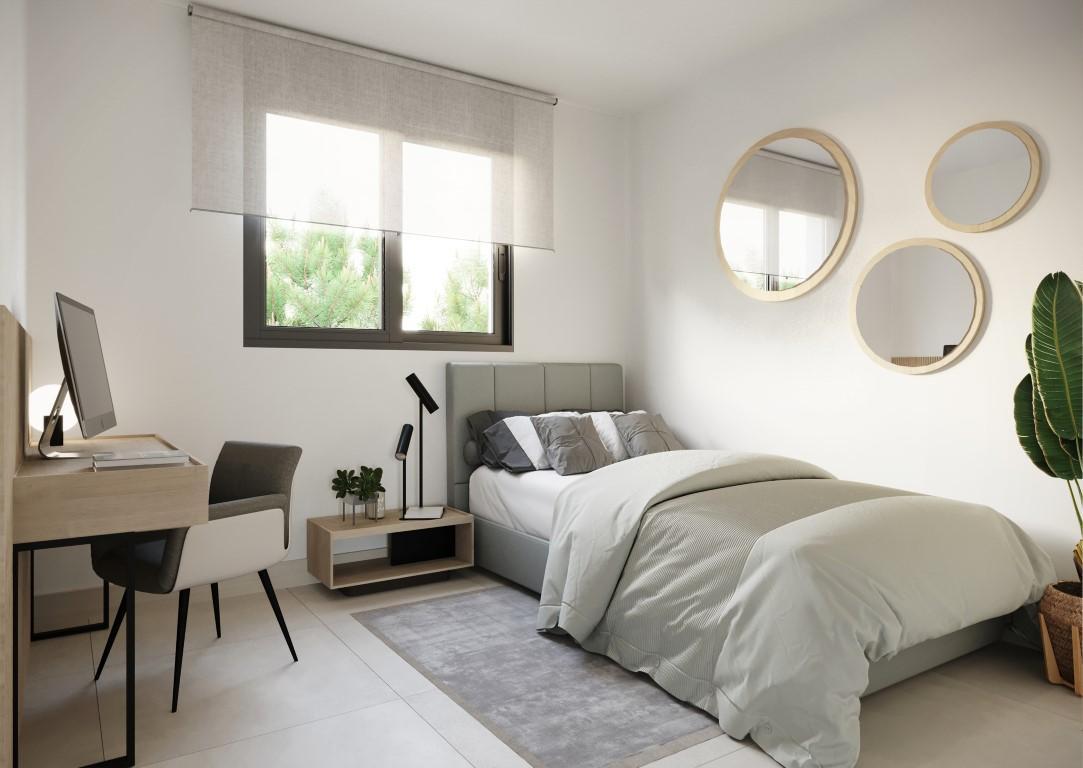 Townhouses overlooking Alicante Golf with modern designs and nearby beach access.
